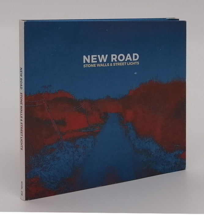 New road. Stone walls & street lights